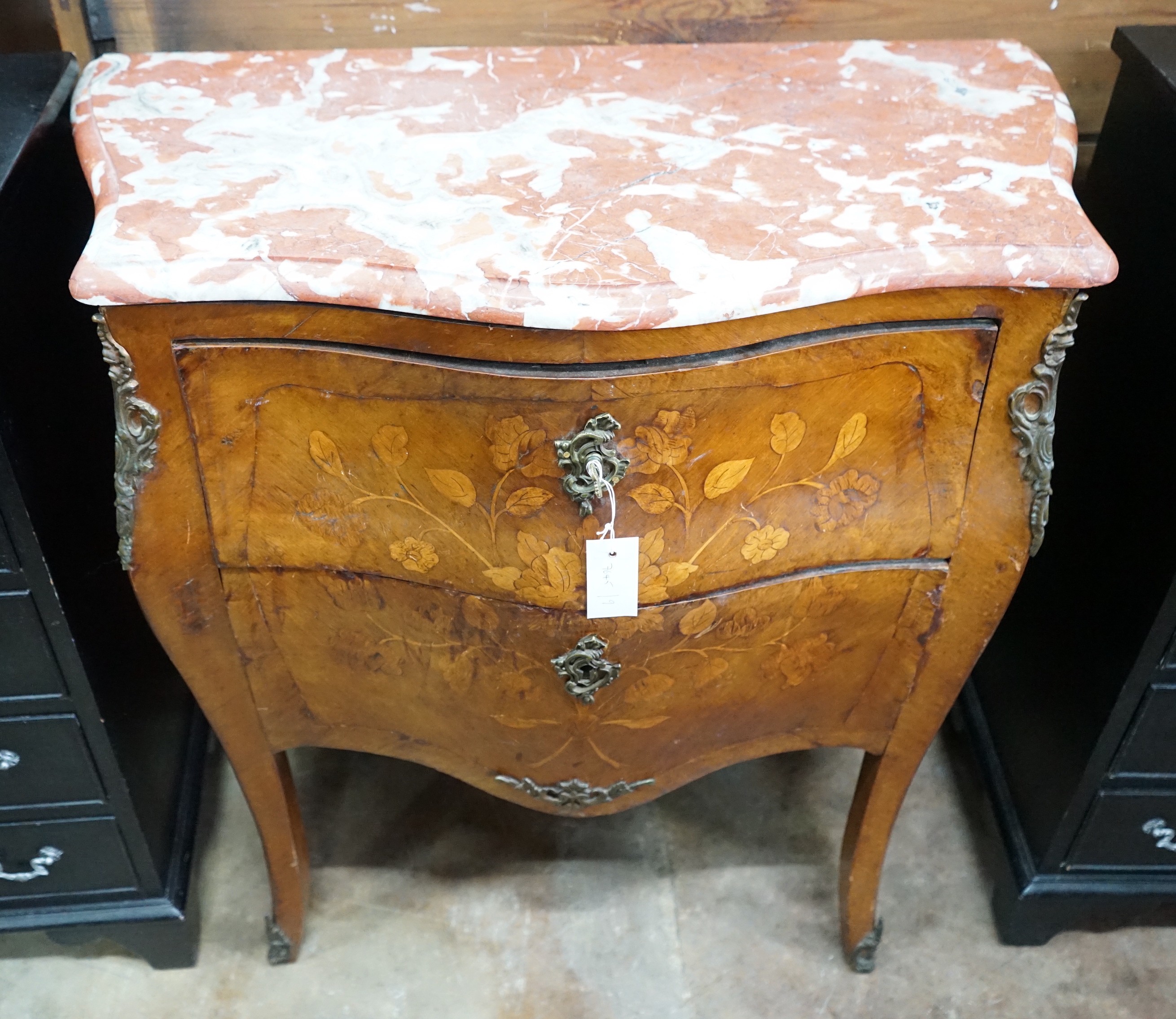 A Louis XVI style marquetry inlaid gilt metal mounted marble top bombe commode, width 83cm, depth 44cm, height 84cm
